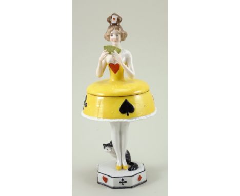 Glazed china Card Playing standing Lady dressing table powder puff, 1920s, wearing low cut yellow dress with heart to front a