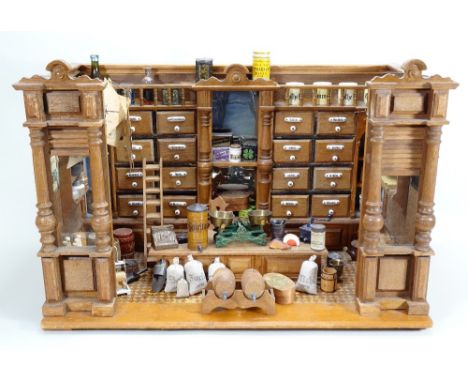 A fine and impressive General Store room-set with contents, German circa 1890, the painted wooden sand stone brick exterior, 