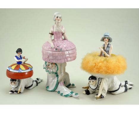 Pierrot dressing table powder puff and trinket box figurines, 1920s, powder box with seated Pierrot in white and green outfit