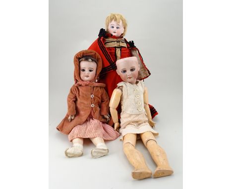 S.F.B.J 60 bisque head doll, French circa 1910, with weighted brown glass eyes, painted lashes and brows, open mouth with upp