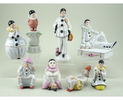 Collection of glazed china Pierrot figurines, 1920s, including inkwell with detachable top and hole to top of skull cap, thre