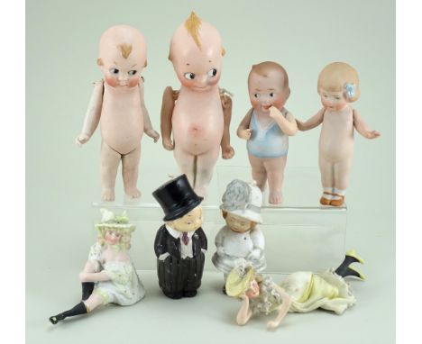 Eight various bisque dolls and figurines, German circa 1910, including a Gbr Heubach girl with painted features, moulded hair