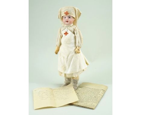 ‘Lizzie’ S.F.B.J 60 bisque head doll in WW1 Red Cross nurses uniform,  1917,  with painted features and short brown wig, on a