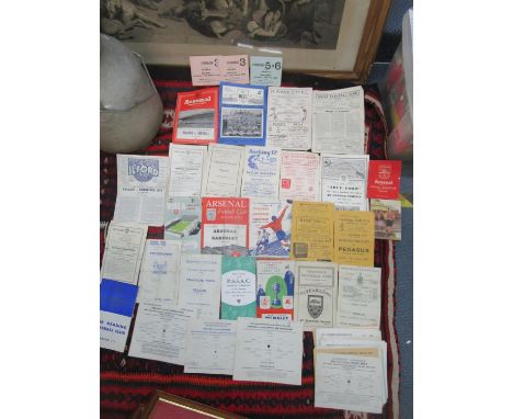 A quantity of 1950's football programmes and ticket stubs mainly for Arsenal FC and non league sides including Pegasus, Barki