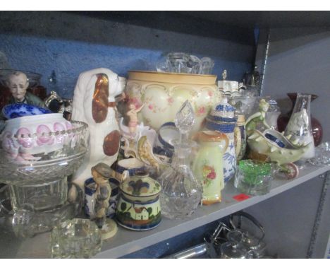 A mixed lot to include a silver plated, topped claret jug, Hummel figures, Capodimonte figure, two silver plated teapots and 