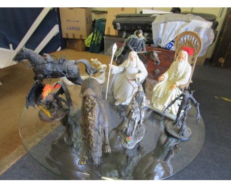 A group of Lord of the Rings toys and ornaments to include a Myth &amp; Magic Gandolf and Shadowfax pewter figure from first 