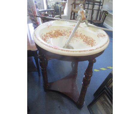 An early 20th century mahogany and ceramic bedroom sink 83cm h x 59cm w 