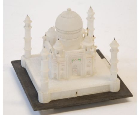 INDIAN CARVED ALABASTER MODEL OF THE TAJ MAHAL, on a square slate base, 6" (15.2cm)  high, 7" (17.8cm) wide, overall 