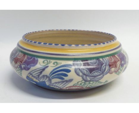 CARTER, STABLER, ADAMS, POOLE POTTERY FRUIT BOWL, shallow, swollen form, floral painted in colours beneath a blue dashed rim,