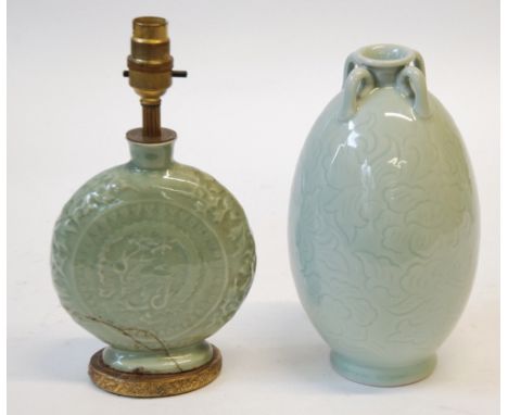 CHINESE CARVED CELADON GLAZED FOUR HANDLED VASE, of ovoid form, 9" (22.9cm) high, TOGETHER WITH A CELADON GLAZED MOON FLASK E