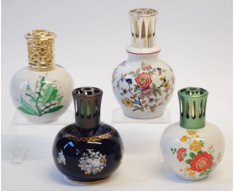 FOUR BERGER, PARIS ESSENCE LAMPS, with spherical ceramic bodies, printed decoration of  various flowers, metal lantern tops, 