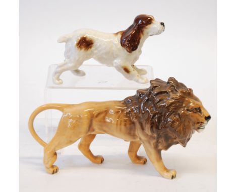 BESWICK CHINA MODEL OF A LION, 5 ½" (14cm) high AND A BESWICK CHINA MODEL OF A SPANIEL, 3 ½" (9cm) high, printed marks (2)