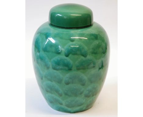 MODERN POOLE POTTERY GREEN GLAZED GINGER JAR AND COVER, typical form, decorated in stylised design of bands of cloud or mushr