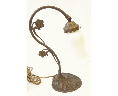 ART NOUVEAU STYLE PATINATED METAL TABLE LAMP, with foliate scrolling stem and mother o'pearl iridescent glass shade, 14 3/4" 