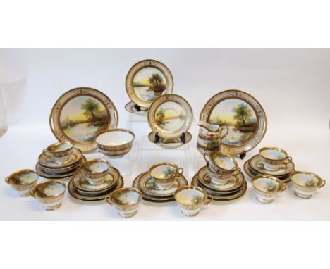 1930's JAPANESE NORITAKE PORCELAIN 40 PIECE TEA SERVICE, each enamelled in the English taste with wooded river landscapes wit