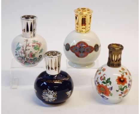 FOUR BERGER, PARIS ESSENCE LAMPS, with spherical ceramic bodies, printed decoration of various flowers, bright metal lantern 