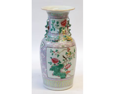 EARLY TWENTIETH CENTURY CHINESE PORCELAIN BALUSTER VASE, enamelled in tones of pink and green, with panels decorated with flo