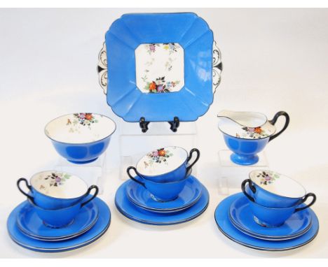 1930's SHELLEY PORCELAIN 21 PIECE TEA SERVICE, the vibrant blue ground reserved with floral printed and enamelled sprays, des