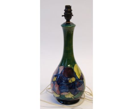 WALTER MOORCROFT "ANEMONE" PATTERN TUBE LINED POTTERY BOTTLE SHAPED TABLE LAMP BASE, 13 ½" (34.3cm) high (excluding fittings)
