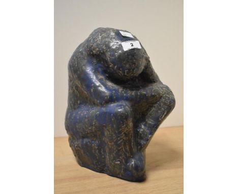 After Clochard Mourant (Paris), A contemporary ceramic sculpture in crouching position, having a textured surface on a blue g