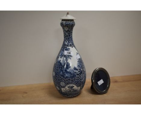 A blue and white baluster vase converted into a table lamp, h33cm, sold alongside an oval silver picture frame, h10.5cm.