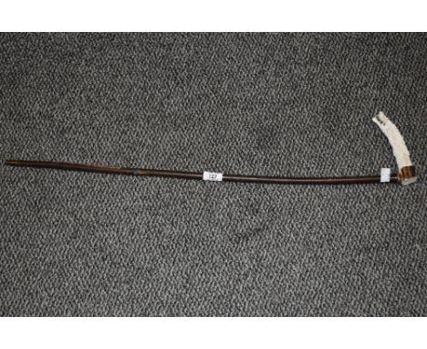 A late 19th / early 20th century walking stick, the antler handle intricately hand carved depicting Chinese dragon, L77cm