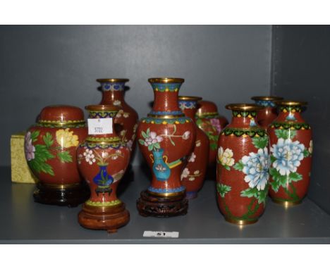 A group of oriental enamel Cloisonne ware, to include miniature baluster vases on wooden stands, ginger jars and trinkets, de
