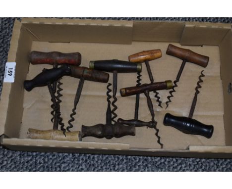A box containing various 19th century hand pull corkscrew bottle openers, L13cm.
