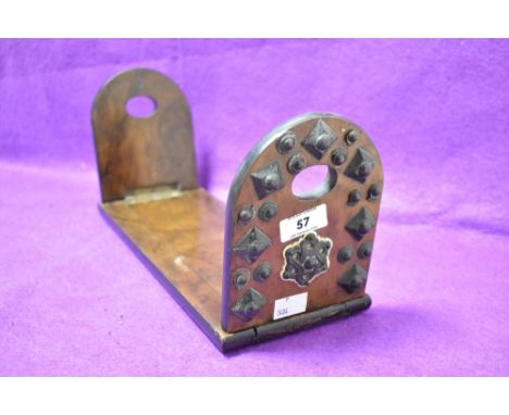 A Victoria walnut Gothic style folding book trough, having brass stud decoration, L33cm.