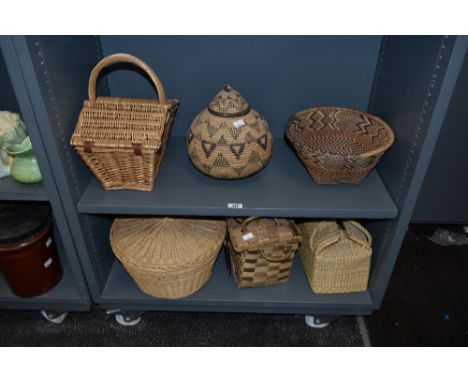 An ethnic African woven-fibre lidded vessel and similar bowl, sold alog with a woven-wicker hamper and three other baskets