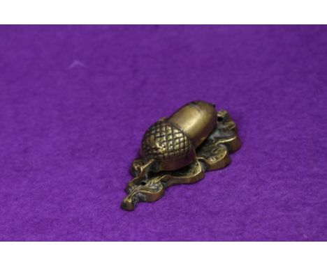 An unusual cast-brass acorn and oak leave door knocker, of small proportions 7cm