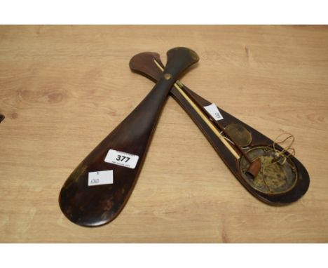 A set of mid-19th century eastern opium scales, housed within a pivoted mahogany club shaped travel case, L29cm.