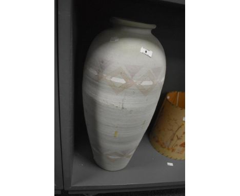 A large mid-century teracotta baluster vase, having Aztec patterns on an egg shell ground, h59cm.