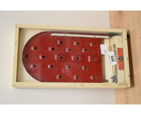 A miniature bagatelle games board manufactured by The Chad Valley Co, Ltd, appointment Toymakers to H.M.The Queen, h29, sold 