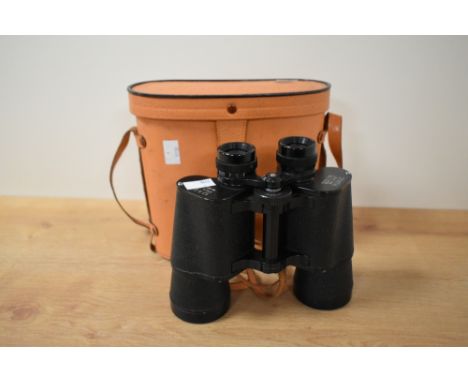 A Zenith Zeiss type 12 x 5 binoculars with brown leather carry case, stamped 'Japan' to base, H20cm.
