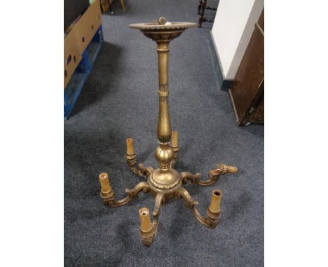 A gilt six way light fitting