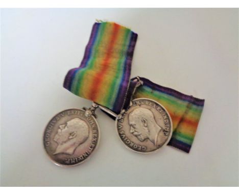Two WWII medals - 7736 Pte L Higgins 13- Lond R &amp; 200810 Pte. P. Higgins 1- Lond R. (2)