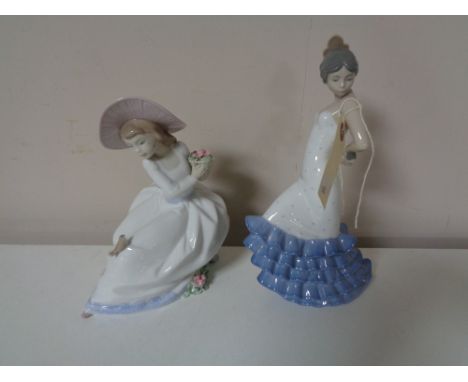 Two Nao figures of a girl and a Spanish dancer 