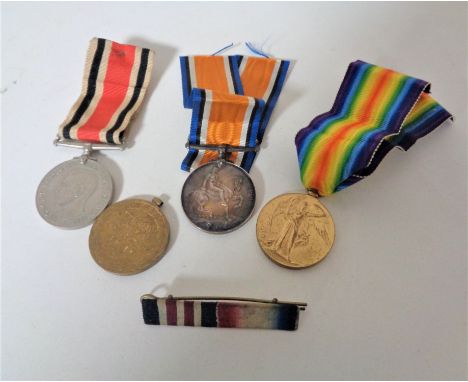 Three WWI medals together with one WWII medal - 203723 Pte J L Lindley, L N Lan, 75010 Spr H Firth RE, 101335 J Morris R A M 