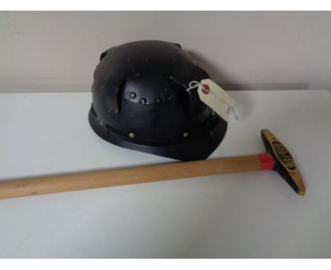 A 20th century Huwood light type miner's helmet together with a pickaxe 