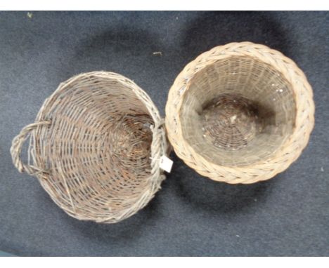 Two vintage wicker log baskets 