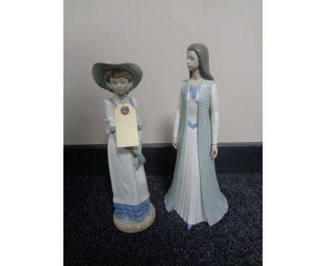 Two large Nao figures - girl with bonnet and lady in flowing dress 