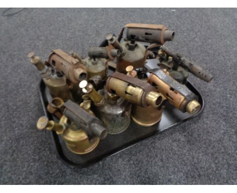 A tray of seven vintage blow lamps 