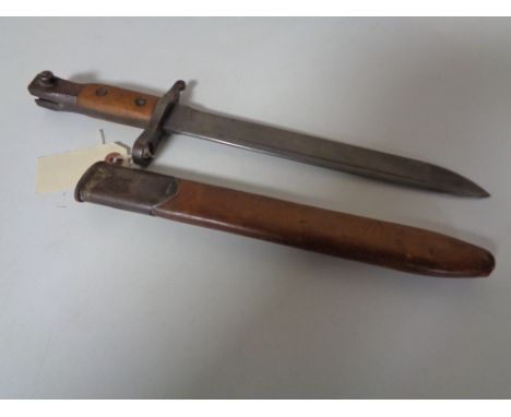 A First World War Ross Rifle Company bayonet in scabbard, dated 9/14