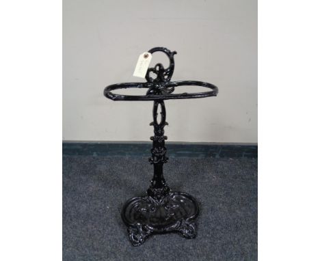 A painted cast iron stick stand