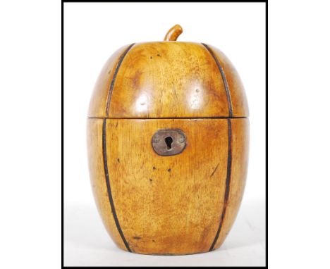 An 18th Century Georgian style fruitwood tea caddy in the form of a melon with lock and key to front. Measures 15cm tall by 1