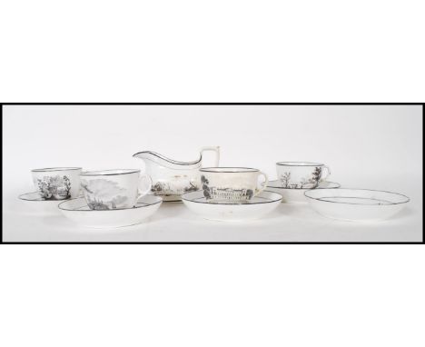 An early 19th century New Hall porcelain part tea service, consisting of four tea cups, five saucers and a creamer, black and