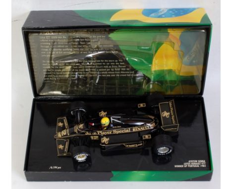 A Minichamps Ayrton Senna racing car collection 1:18 scale model of a Lotus Renault 97T winner of the Grand Prix Portugal 198