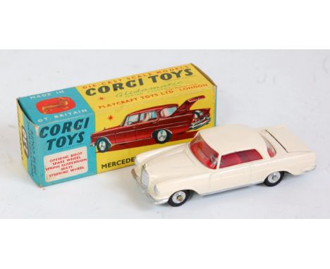 Corgi Toys, 230, Mercedes Benz 220 SE Coupe, cream body with red interior, spun hubs, in the original blue and yellow all car