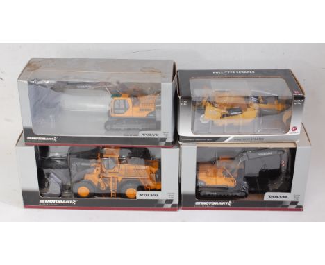 A Motor Art 1:50 scale boxed construction vehicle diecast group to include a Volvo EC240B tracked excavator, a Volvo L350F wh